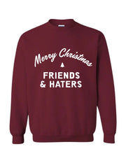 red crewneck sweatshirt with "Merry Christmas Friends & Haters" printed on middle front of sweatshirt in white writing. 