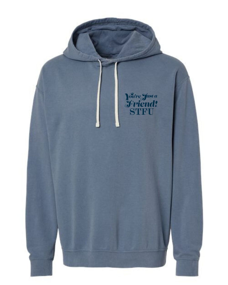 Front of a blue hoodie with the words You're Just a Friend STFU printed in blue on the left chest pocket area. 